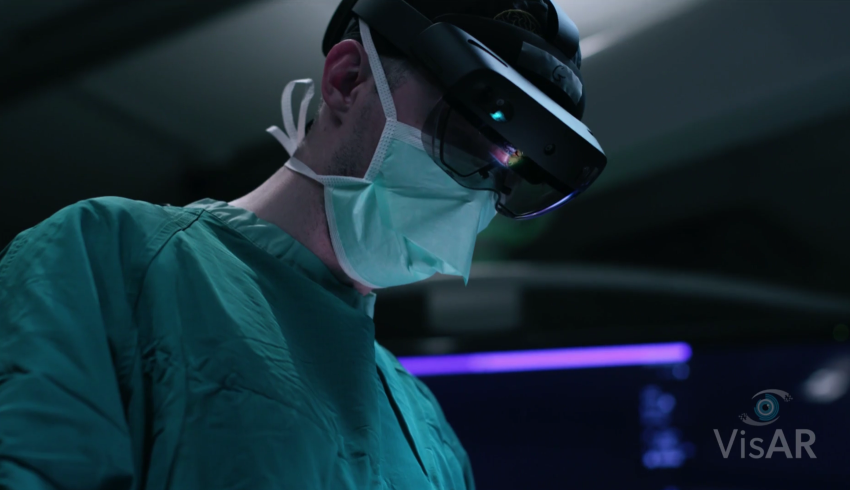Clinician using Novarad VisAR augmented reality headset during an interventional procedure